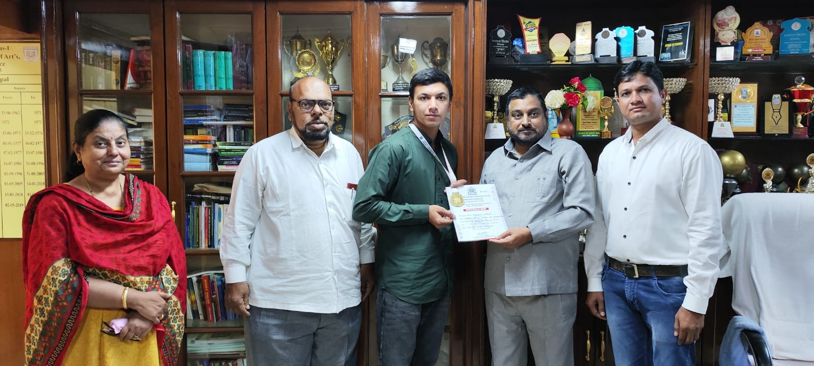 Dr.Mazahar Ahmed Farooqui sir felicitated Mr.Mohd.Faizullah student of B.Com E Commerce II year.He received the Gold Medal in Dr.BAMU ICT Boxing championship.23-24