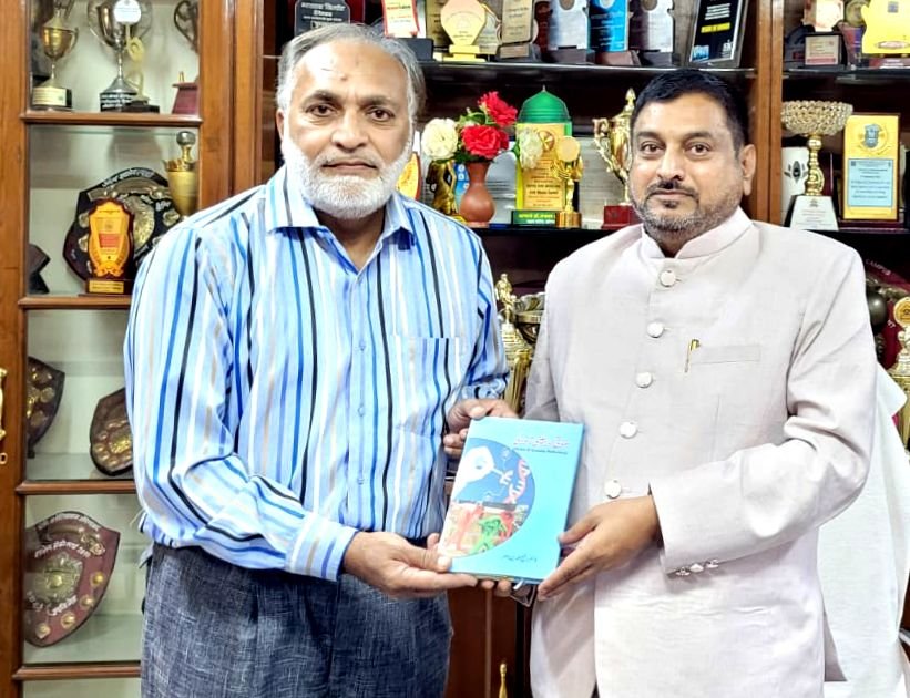 Prof. Rafiuddin Naser HOD Botany, presenting his  latest publish book entitled 