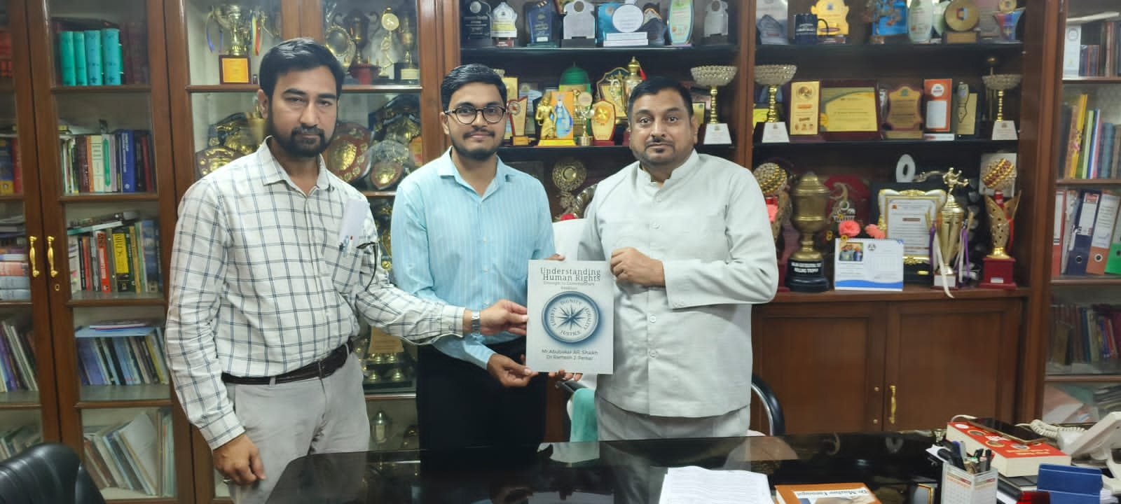 Dr. AbuBakar, an alumnus of the college and Assistant Professor at Government College, visited today and presented his authored book titled Understanding Human Rights.