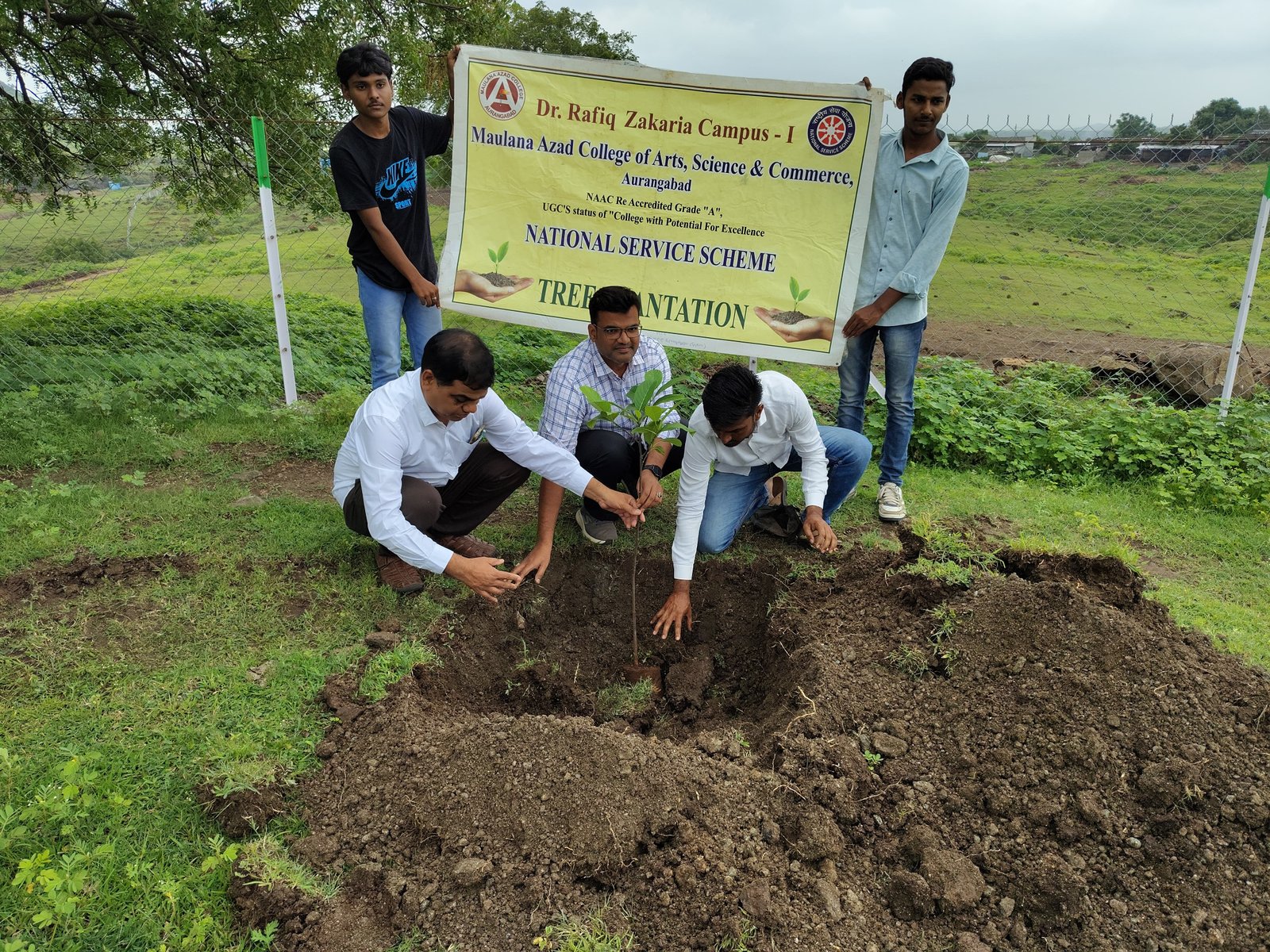 A tree plantation drive was conducted at the NSS-adopted village Rasoolpura, where 45 saplings were planted in the Kabrastan premises.  Master Faizan, a Class V student of Zilla Parishad Marathi Medium School, who secured 82% in the Scholarship Exam, was felicitated and gifted a school bag, while notebooks and chocolates were distributed to other school children with the. hands of Principal Dr.Mazhar Ahmed Farooqui Sir and Mr.Mysa Pathan ( Up Sarpanch, Rasulpura Village)  NSS Program Officer Dr. J.D. Shaikh, Dr. Musa Razzak, faculty members Dr. Sayed Sultan and Dr. Ashfaq Khan, along with NSS volunteers, were present for the event.