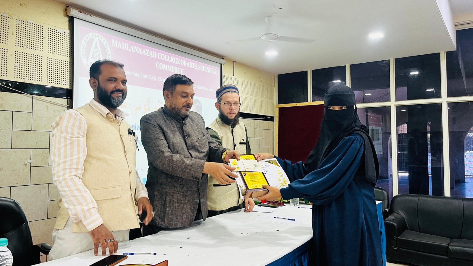 Maulana Azad College Naat, Ghazal and Tarana Competition  Under the chairmanship of Principal Dr. Mazhar Ahmed Faruqi, the Azadian Group organized a Naat, Ghazal, and Tarana competition at Maulana Azad College. A total prize money of ₹6000 was allocated for this competition.    In each category—Naat, Ghazal, and Tarana—the first prize winner received ₹1001 with a memento, the second prize winner received ₹751 with a memento, and the third prize winner received ₹251 with a memento.    Naat Category - First Prize: G7 – Shifa Tahera   - Second Prize: G11 – Sofura Asif Patel   - Third Prize: G4 – Madiha Fatima    Tarana / Ghazal / Nazm Category - First Prize: B17 – Mohipur Ghazal Rahman   - Second Prize: G25 – Mirza Aisha   - Third Prize: G23 – S.K. Sadaf    Tarana (Second Group) - First Prize: B16 – Sheikh Noman   - Second Prize: G32 – Fareha Fatima   - Third Prize: B7 – Gulhe Sohrab    For encouragement, nine students received medals, and all participants were given *cert