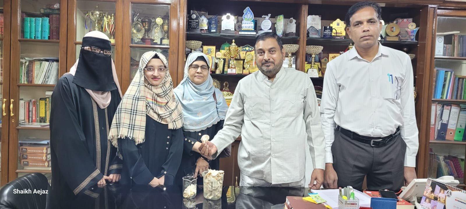 The successful cultivation, harvesting, and post-harvest drying of oyster mushrooms (Pleurotus spp.) as part of an academic project in P.G. Biotechnology. The photographic evidence demonstrates effective substrate colonization, healthy sporophore development, and uniform fruiting, followed by systematic harvesting and controlled drying to enhance shelf life while retaining structural integrity and nutritional quality. Oyster mushrooms are widely recognized for their biotechnological importance due to their rapid growth, lignocellulosic waste utilization, and high protein content. This work was carried out by Miss Tanzeela and Miss Bushra under the scholarly guidance of Mrs. Farooqui Aamena, and it emphasizes the integration of theoretical knowledge with practical skill development in applied mycology, sustainable biotechnology, and post-harvest processing methodologies. We express our sincere gratitude to the respected Principal for providing constant encouragement and a supportive academic environment that made this project possible. The Principal’s visionary leadership and commitment to excellence continue to inspire students toward scientific inquiry and academic growth.